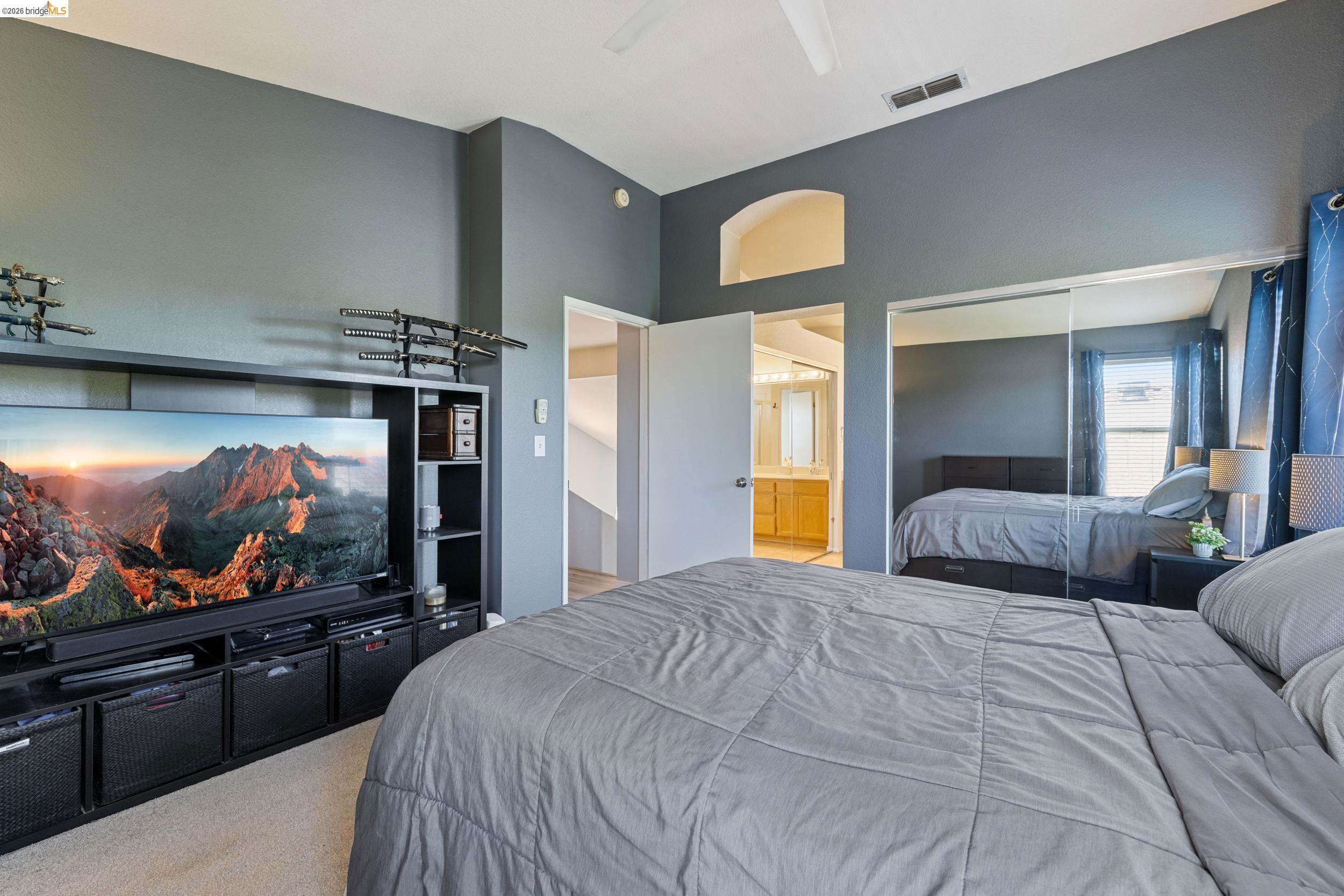 4924 Stirrup Way Antioch, CA 94531 - Photo 26 of 40 a bedroom with a bed and a flat screen tv