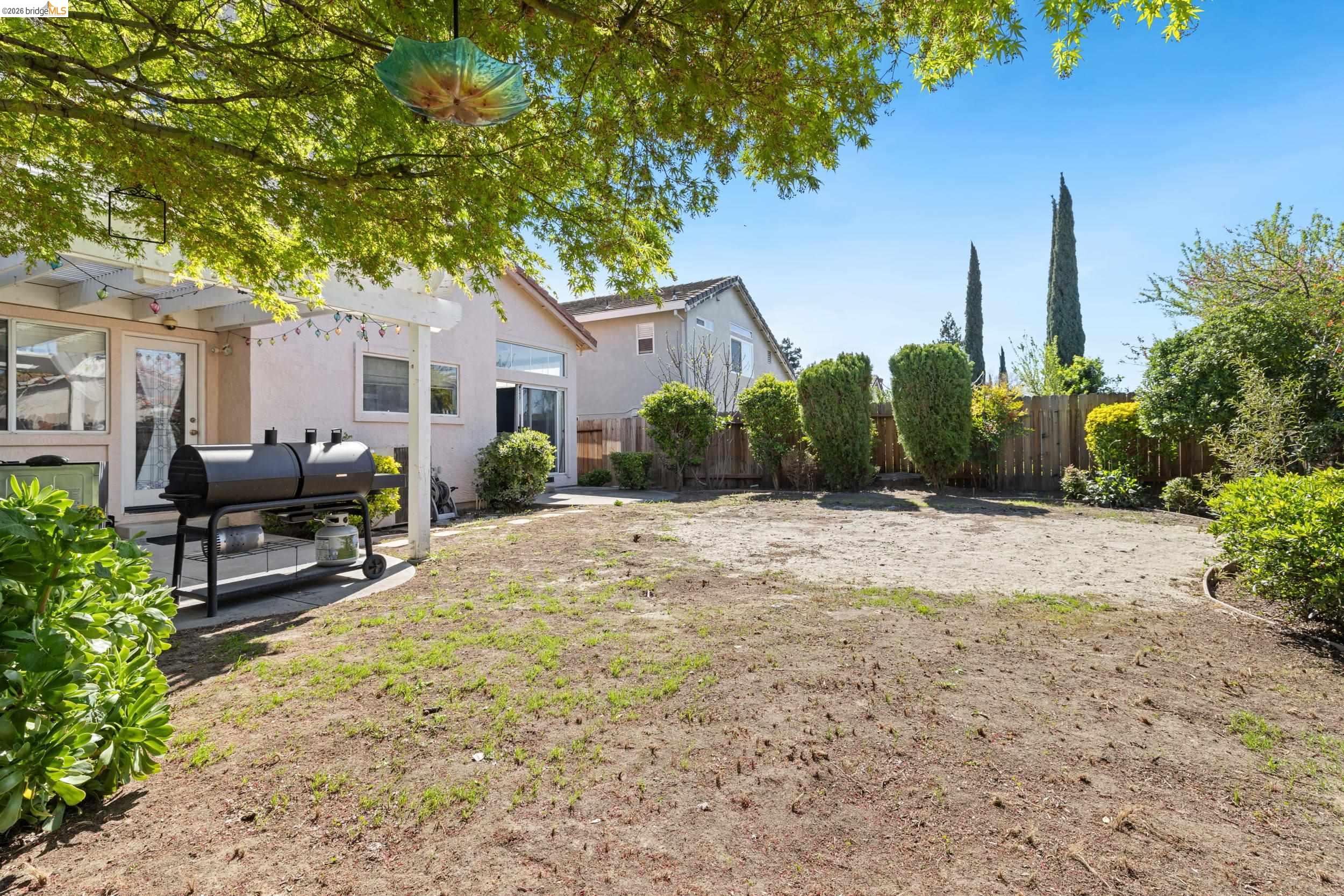 4924 Stirrup Way Antioch, CA 94531 - Photo 32 of 40 a swimming pool with outdoor seating and yard