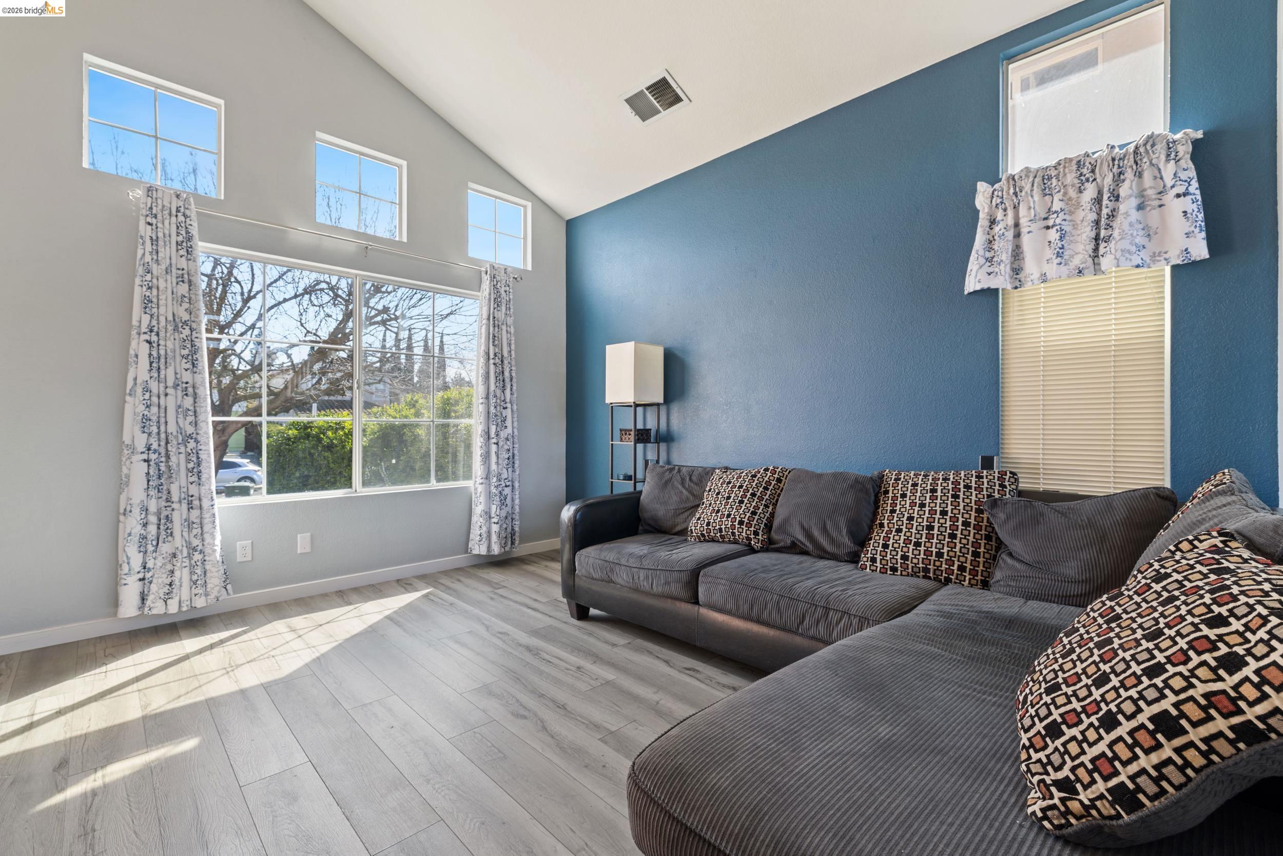 4924 Stirrup Way Antioch, CA 94531 - Photo 5 of 40 a living room with furniture and a large window
