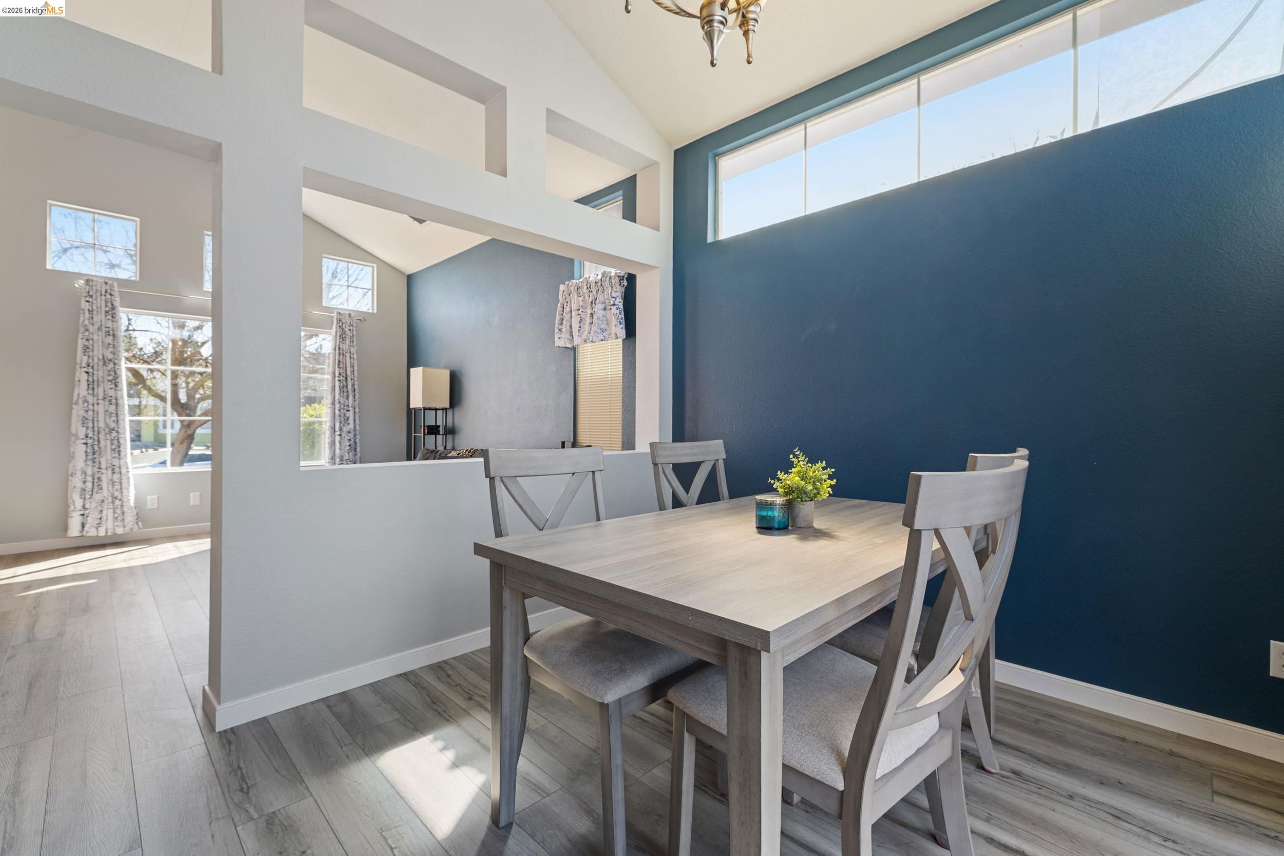 4924 Stirrup Way Antioch, CA 94531 - Photo 7 of 40 a view of a dining room with furniture and wooden floor