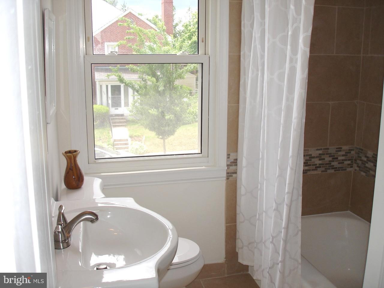 4626 Coleherne Road Baltimore, MD 21229 - Photo 20 of 30 RENOVATED FULL BATH ON UPPER LEVEL