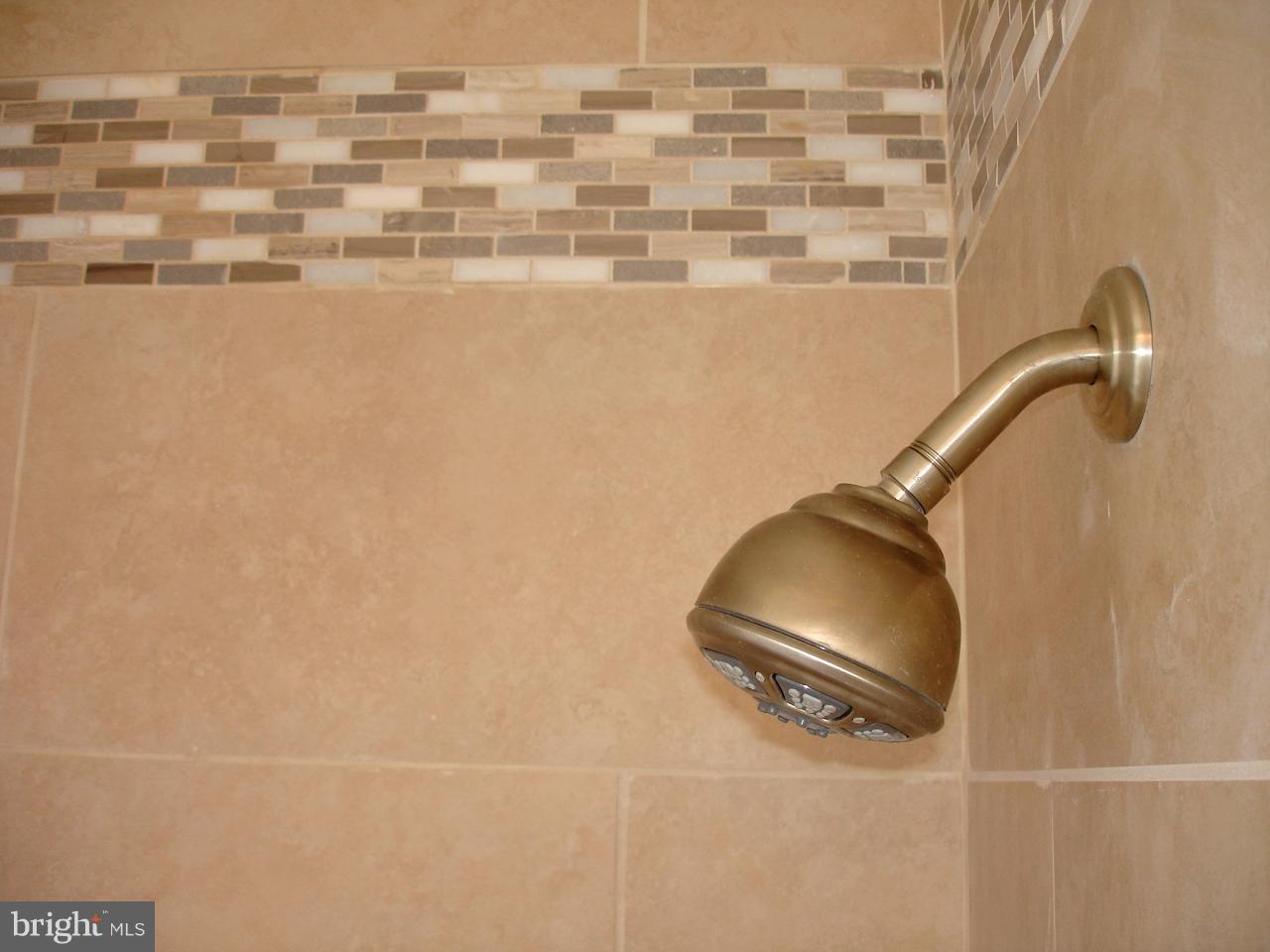 4626 Coleherne Road Baltimore, MD 21229 - Photo 21 of 30 CUSTOM TILE WORK AND ALL NEW FIXTURES