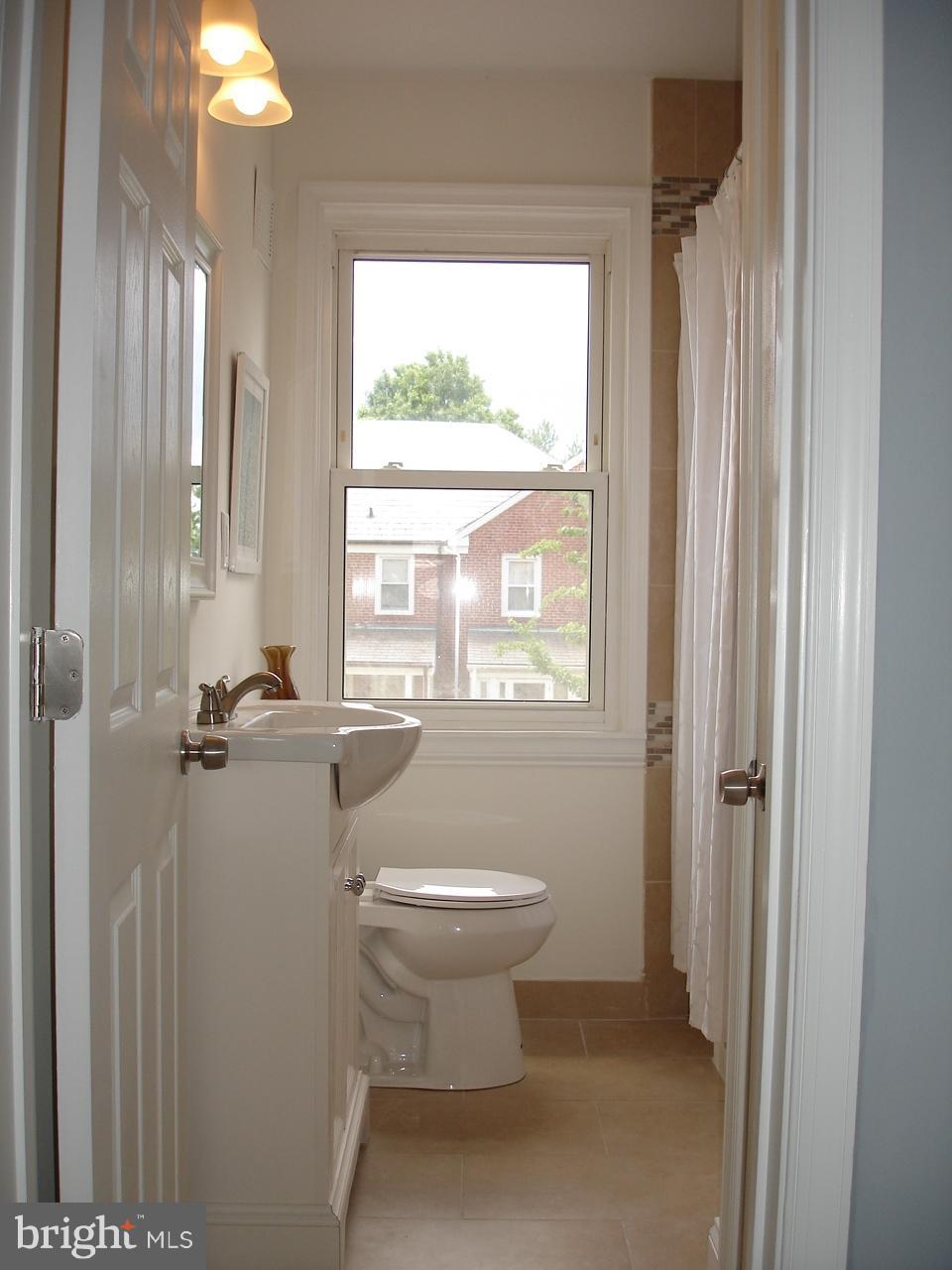 4626 Coleherne Road Baltimore, MD 21229 - Photo 22 of 30 RENOVATED FULL BATH ON UPPER LEVEL