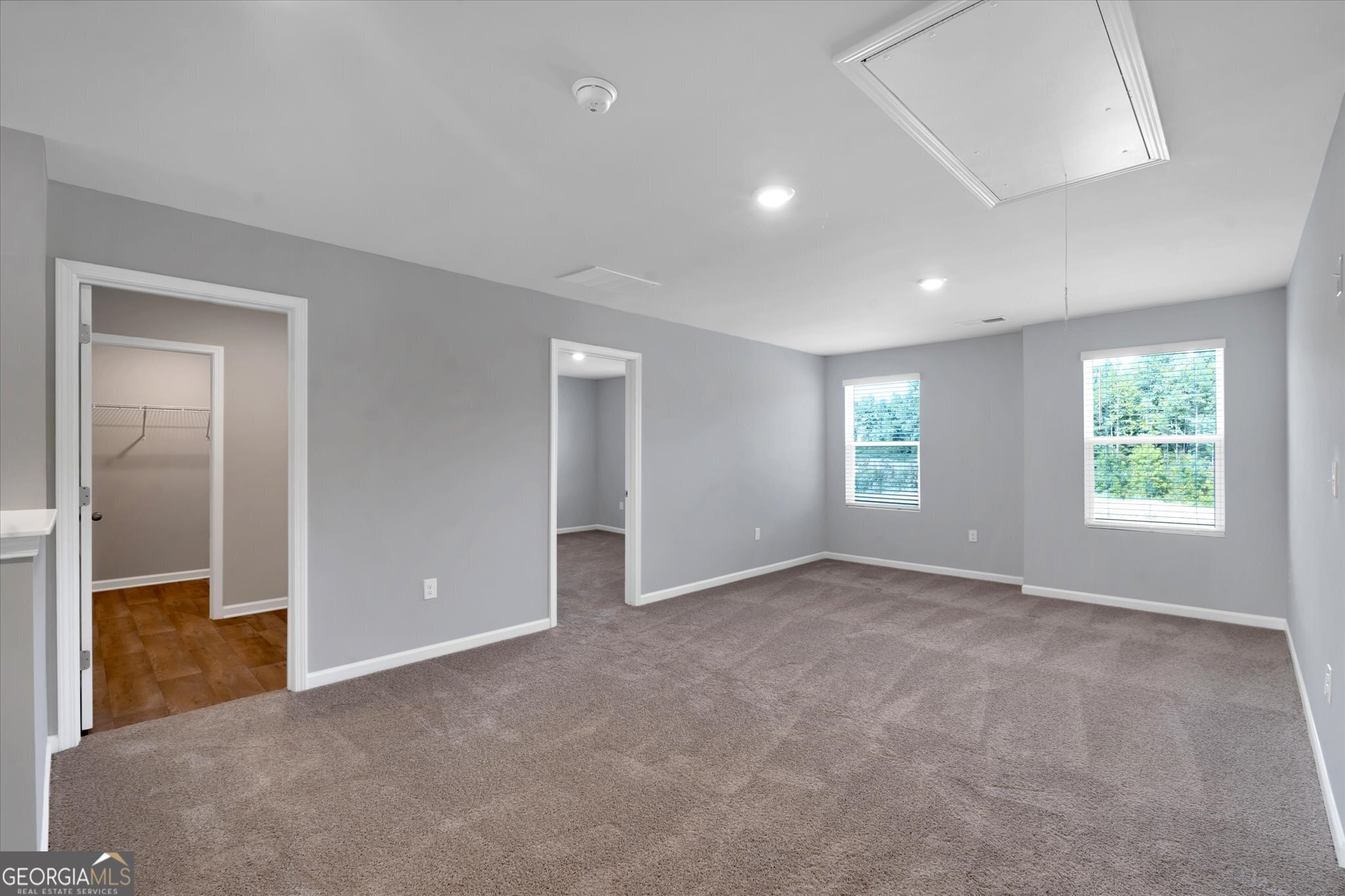 5357 Tolar Road South Fulton, GA 30213 - Photo 11 of 27 an empty room with windows and closet