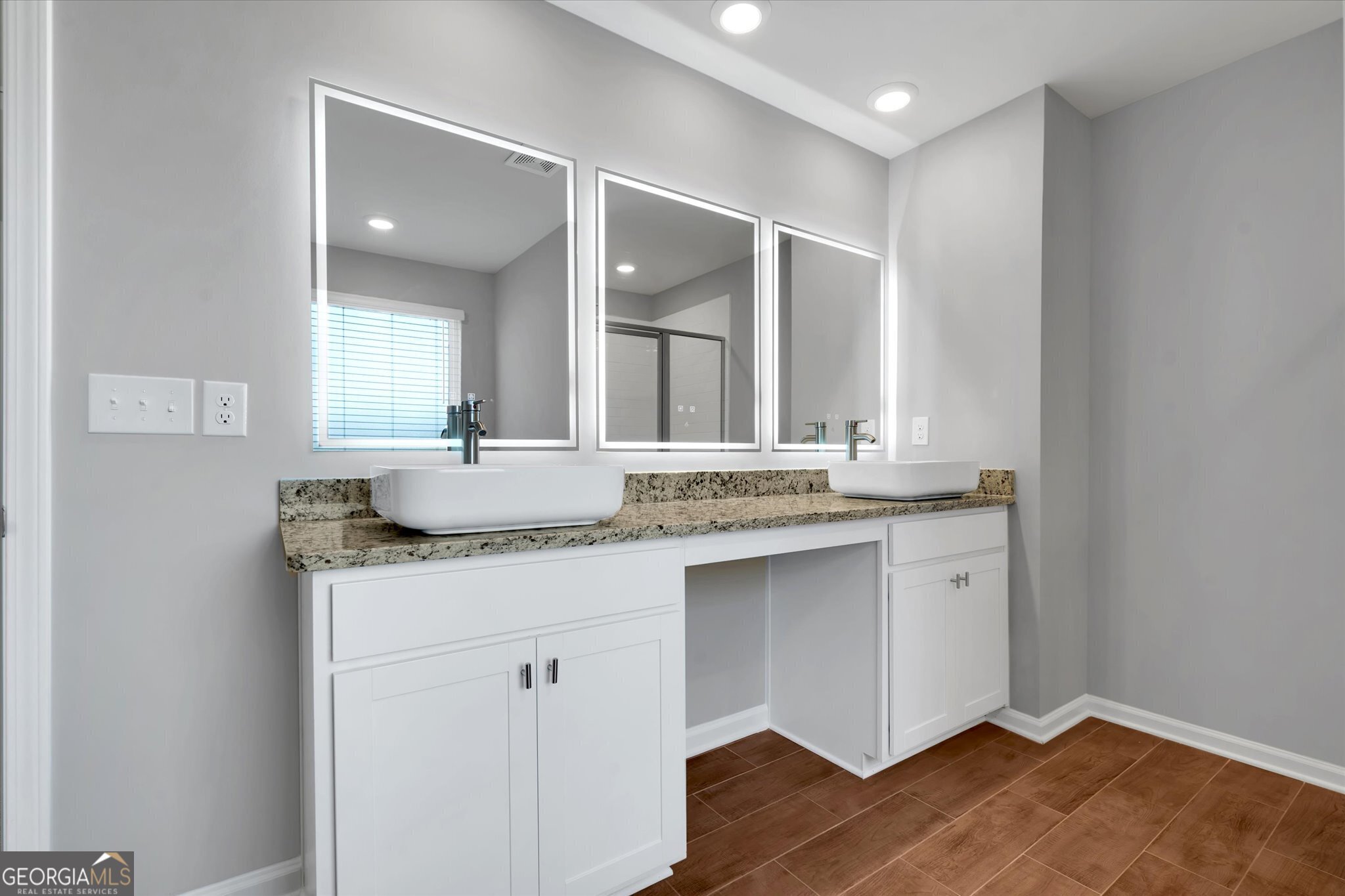 5357 Tolar Road South Fulton, GA 30213 - Photo 12 of 27 a bathroom with a granite countertop sink and a mirror