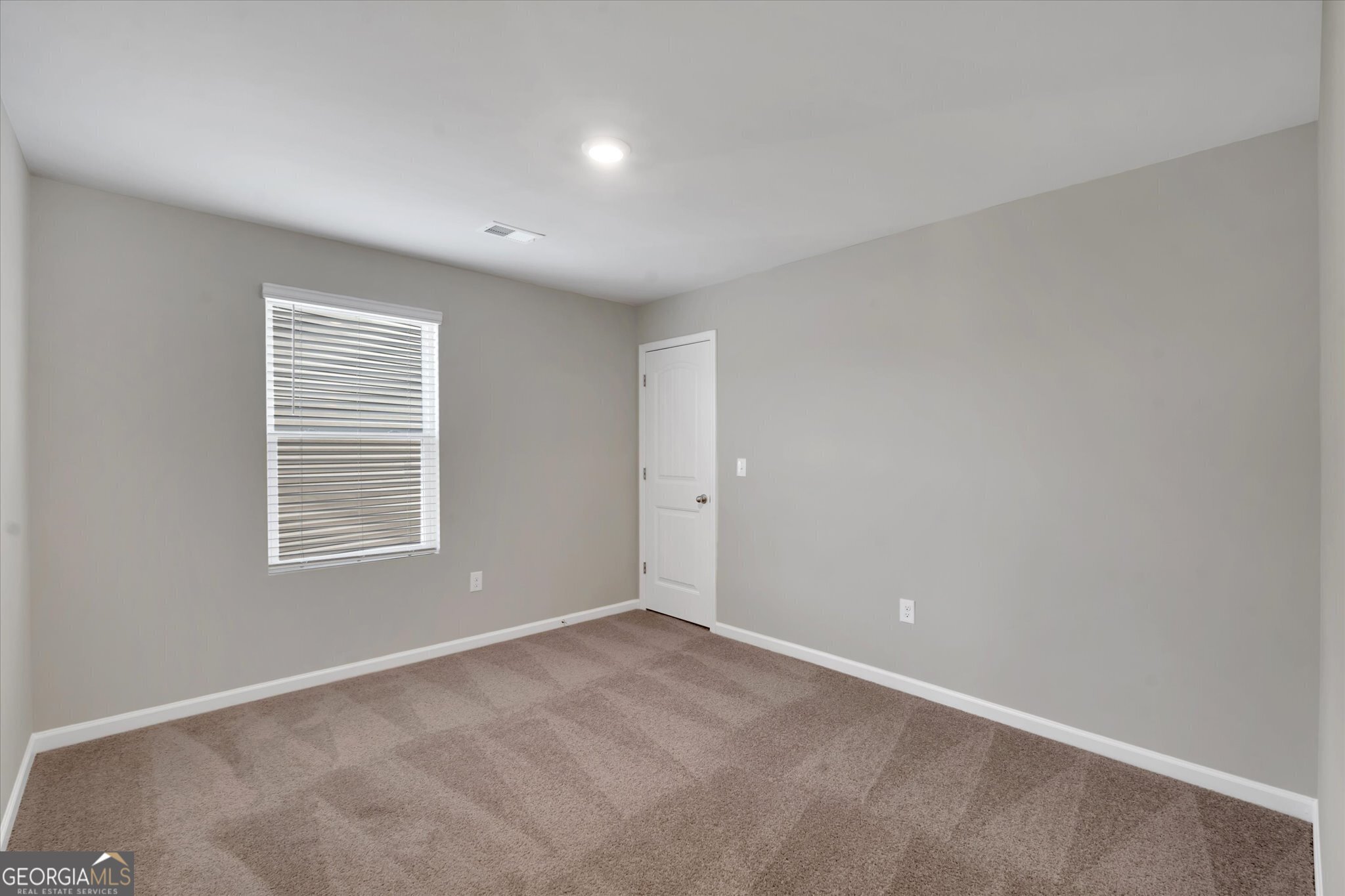 5357 Tolar Road South Fulton, GA 30213 - Photo 15 of 27 a view of an empty room with a window