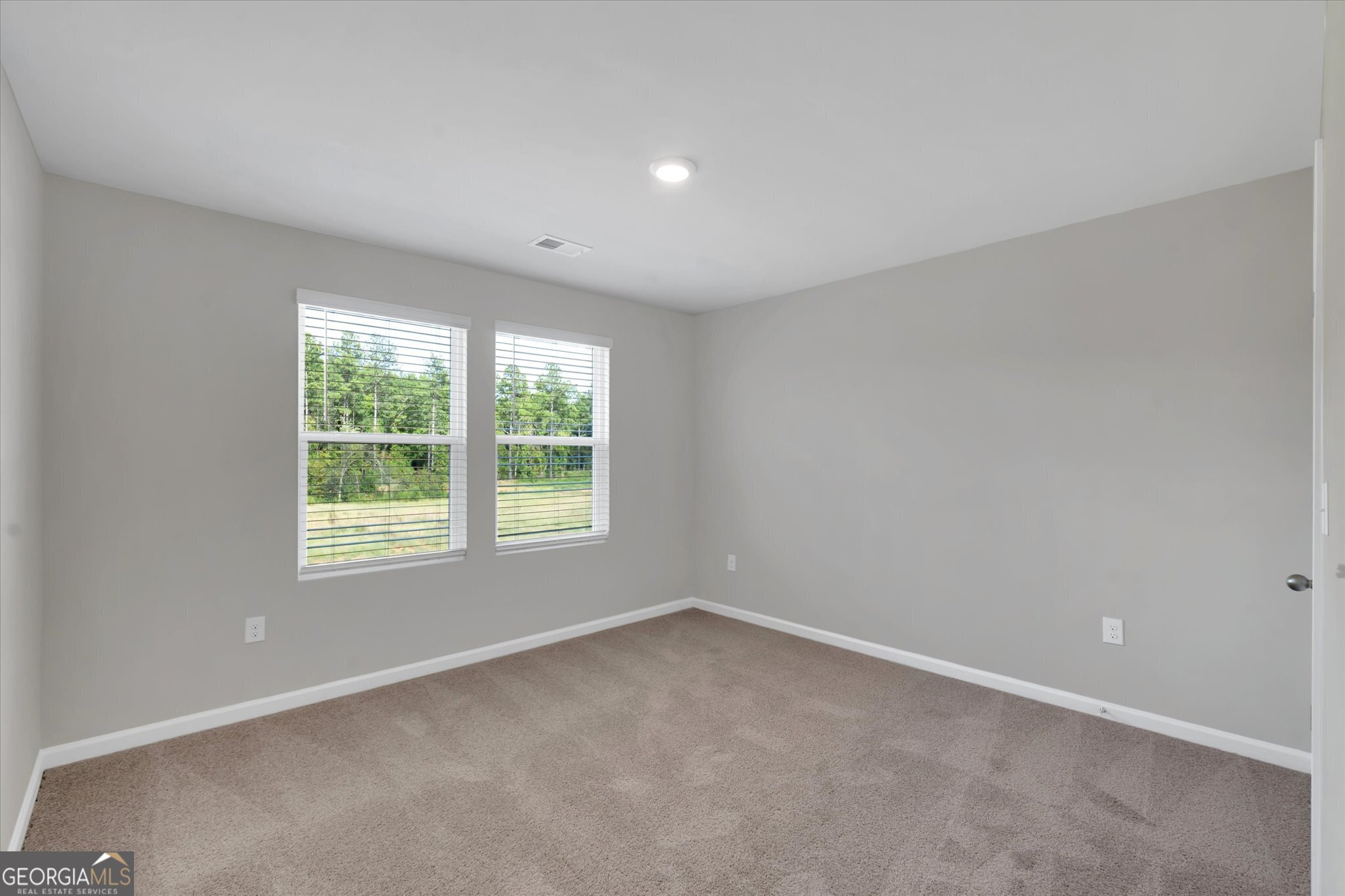 5357 Tolar Road South Fulton, GA 30213 - Photo 16 of 27 an empty room with a window