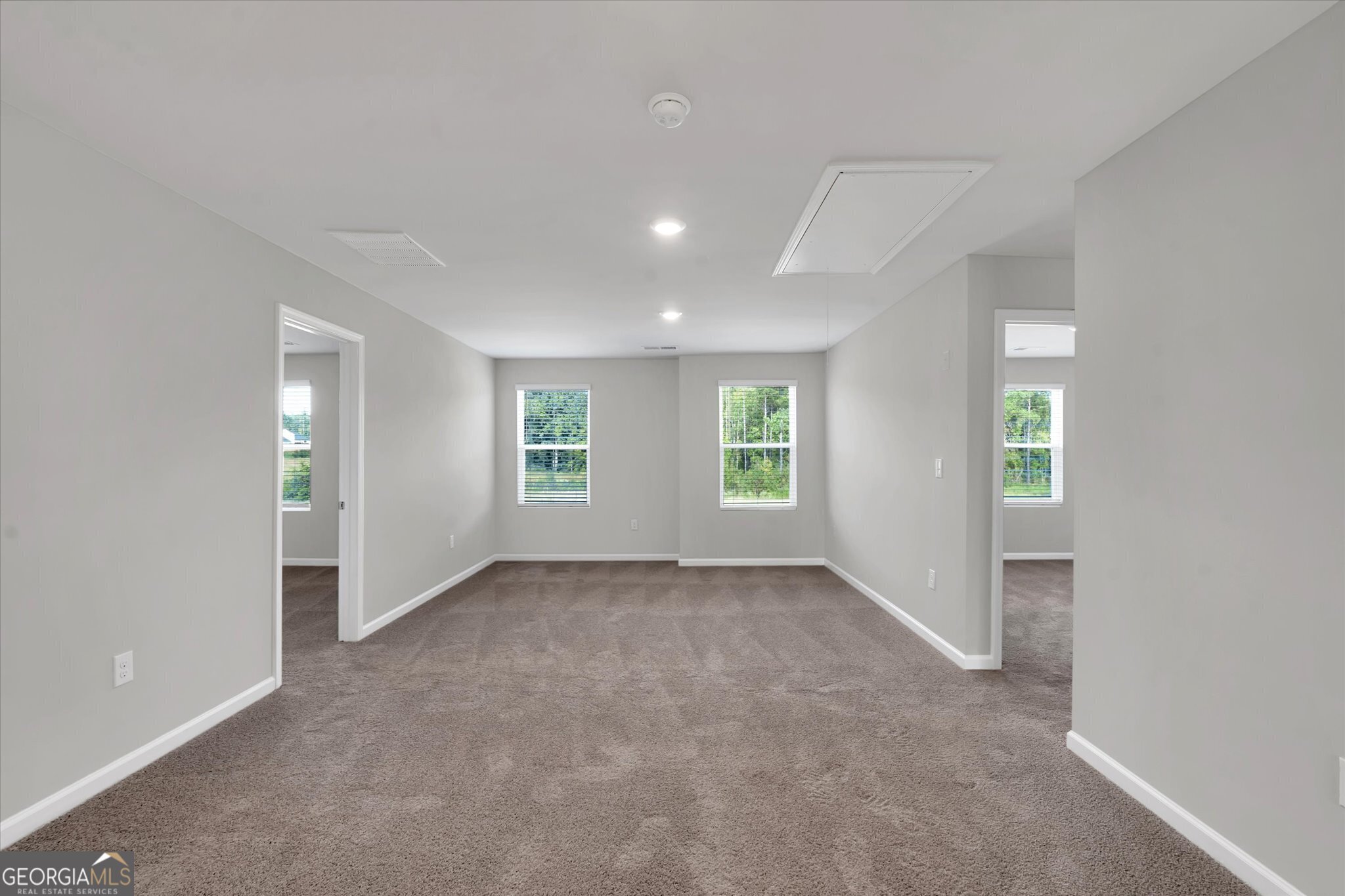 5357 Tolar Road South Fulton, GA 30213 - Photo 7 of 27 an empty room with windows and closet