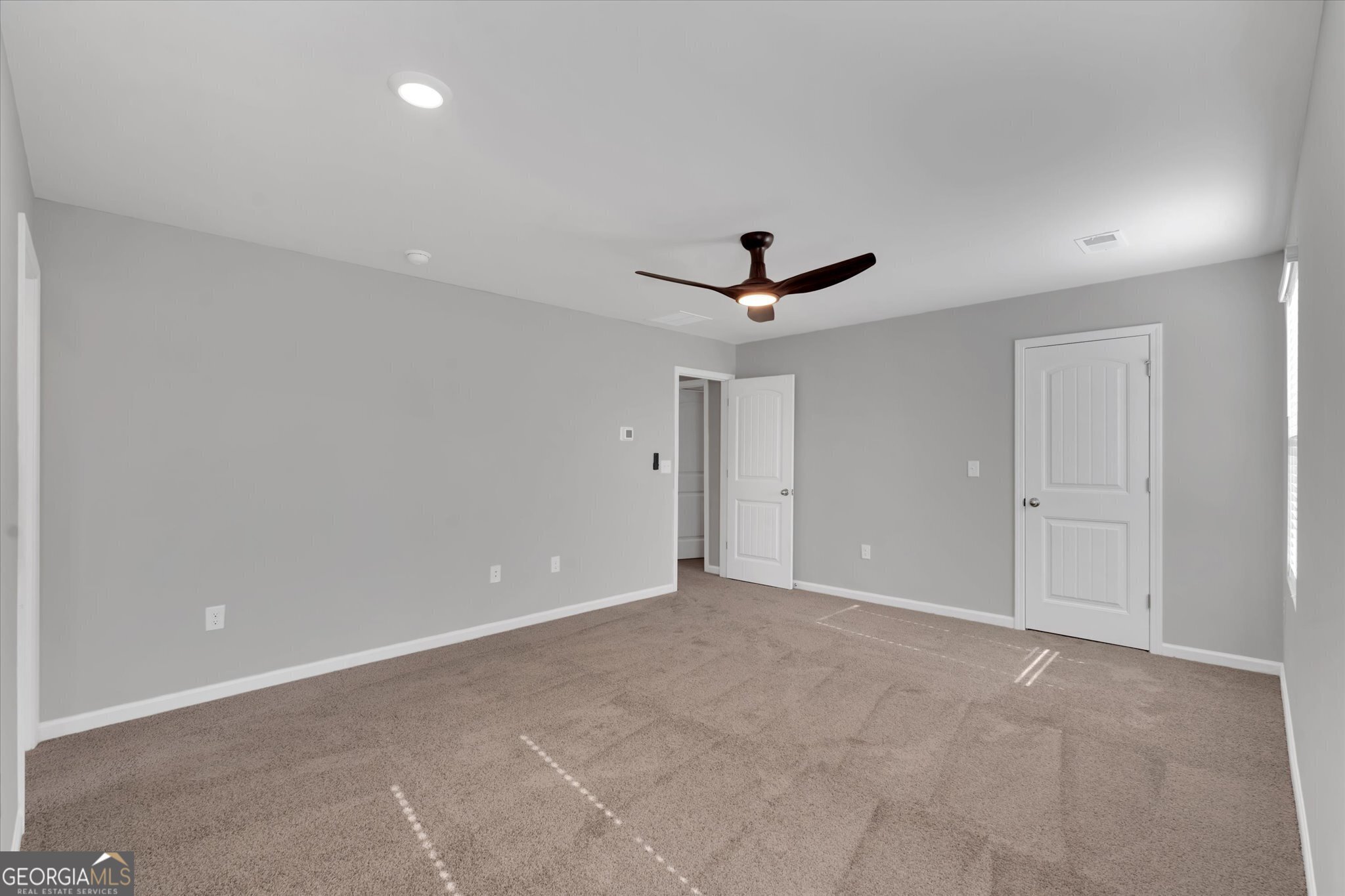 5357 Tolar Road South Fulton, GA 30213 - Photo 9 of 27 a view of empty room with ceiling fan