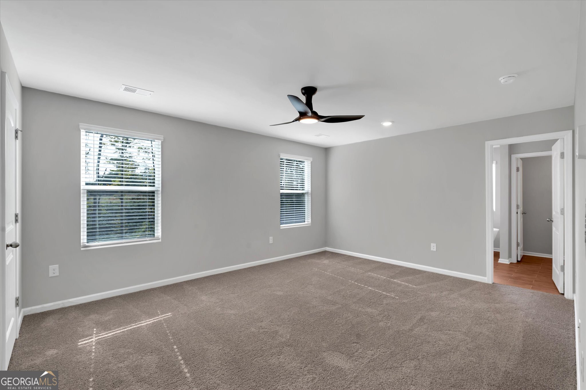 5357 Tolar Road South Fulton, GA 30213 - Photo 10 of 27 a view of an empty room with a window