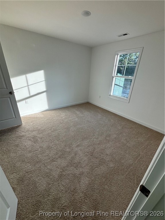 237 Musket Lane Raeford, NC 28376 - Photo 17 of 18 a view of an empty room with windows