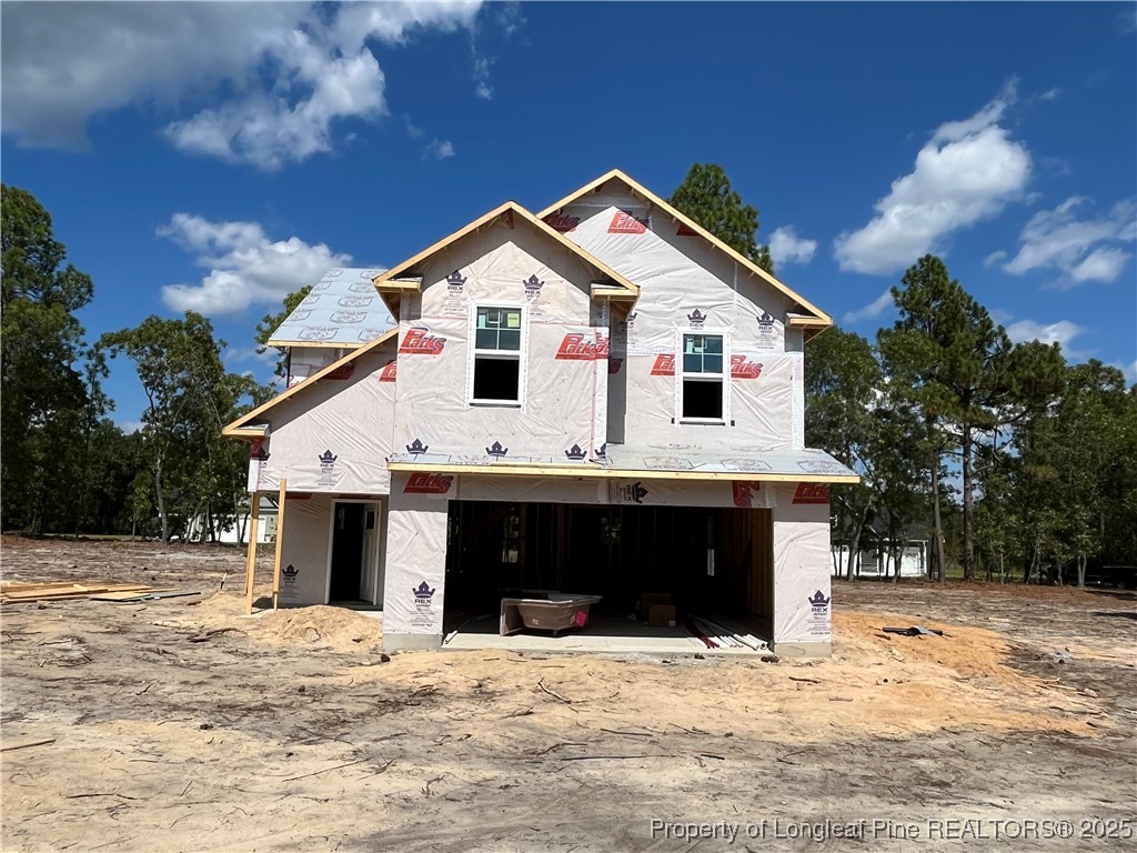 237 Musket Lane Raeford, NC 28376 - Photo 3 of 18 a front view of a house with a yard
