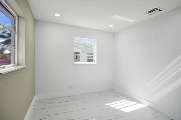 an empty room with a window