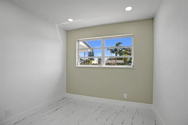 a view of a bathroom with wooden floor