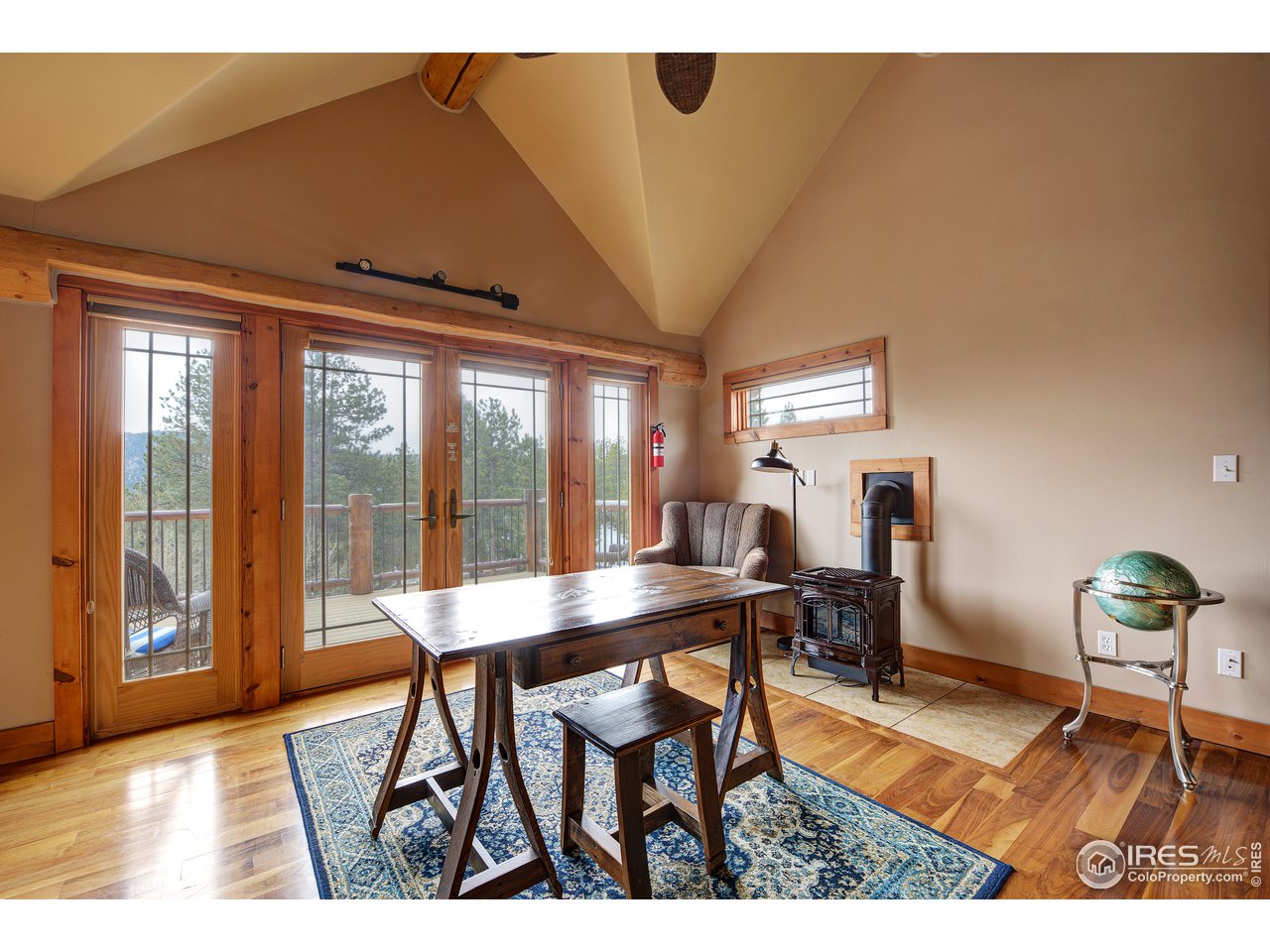 500 Ridge Road Ward, CO 80481 - Photo 15 of 31 a dining room with furniture and wooden floor