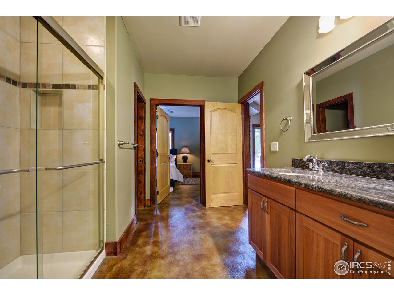 500 Ridge Road Ward, CO 80481 - Photo 20 of 31 a bathroom with a sink a toilet and a mirror