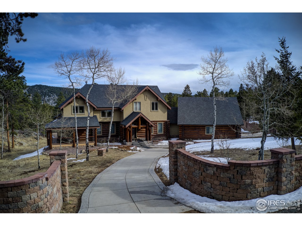 500 Ridge Road Ward, CO 80481 - Photo 2 of 31 a view of a swimming pool with a patio