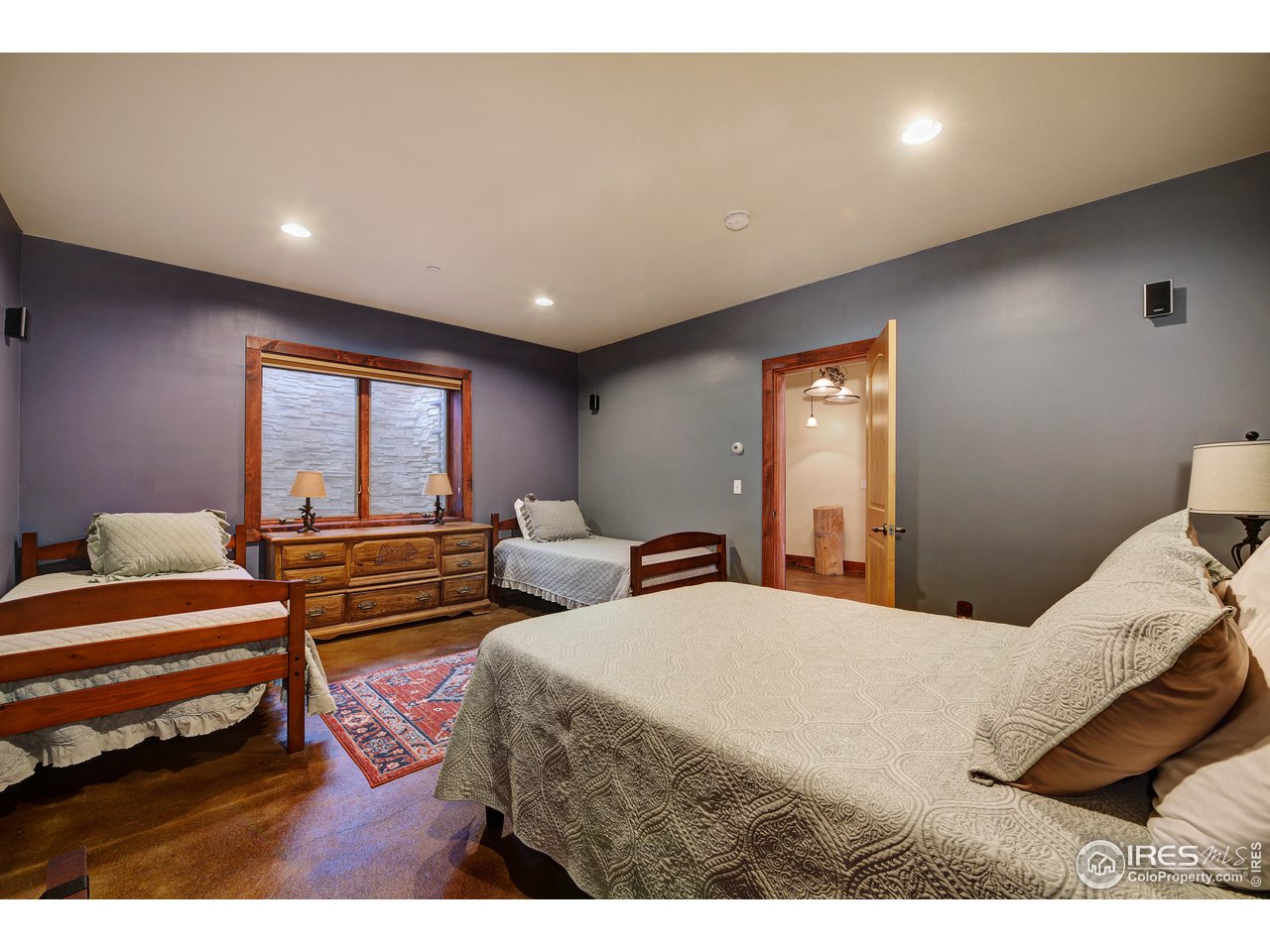 500 Ridge Road Ward, CO 80481 - Photo 24 of 31 a bedroom with two beds and a couch