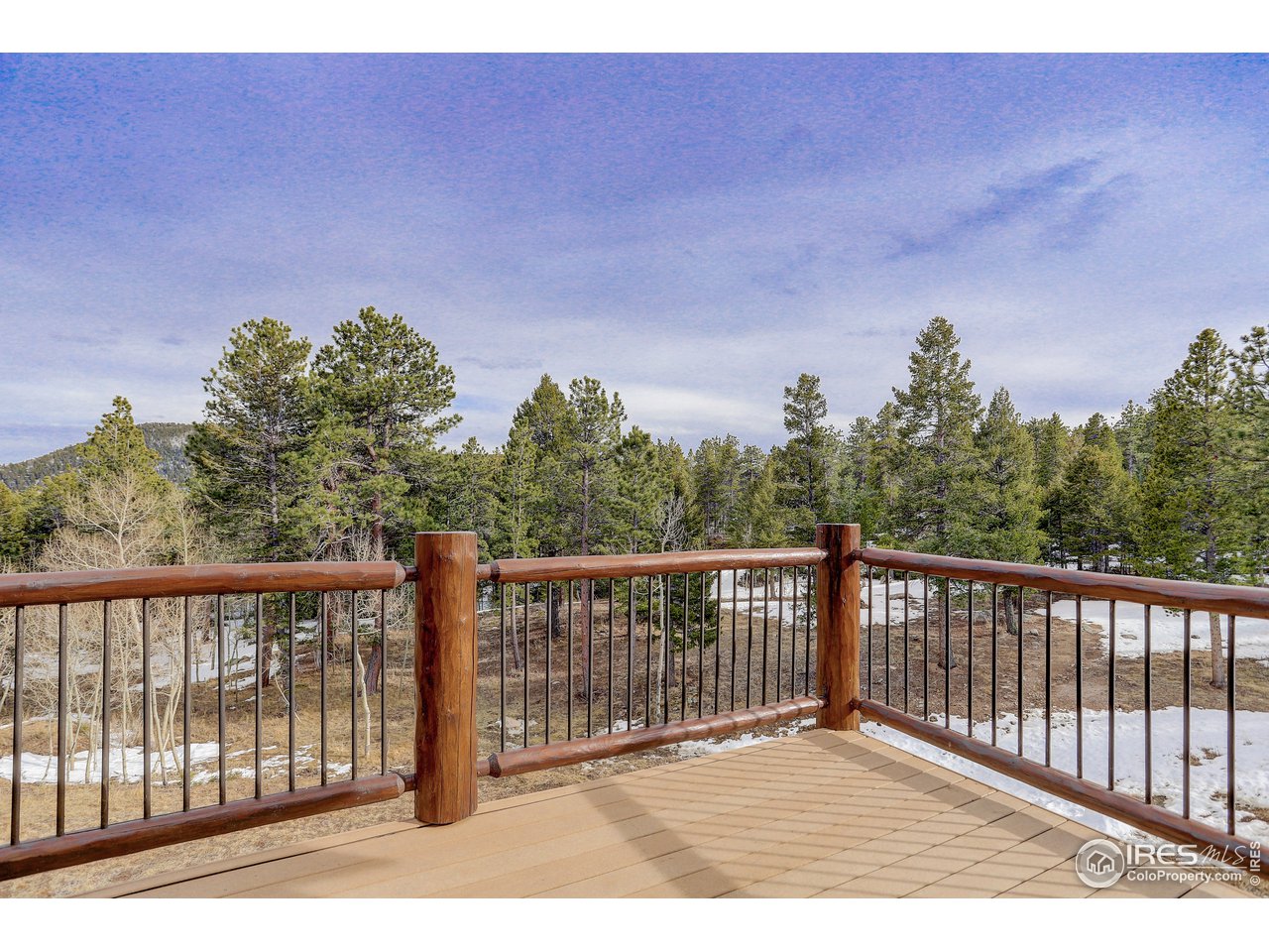 500 Ridge Road Ward, CO 80481 - Photo 26 of 31 a view of a balcony with wooden fence