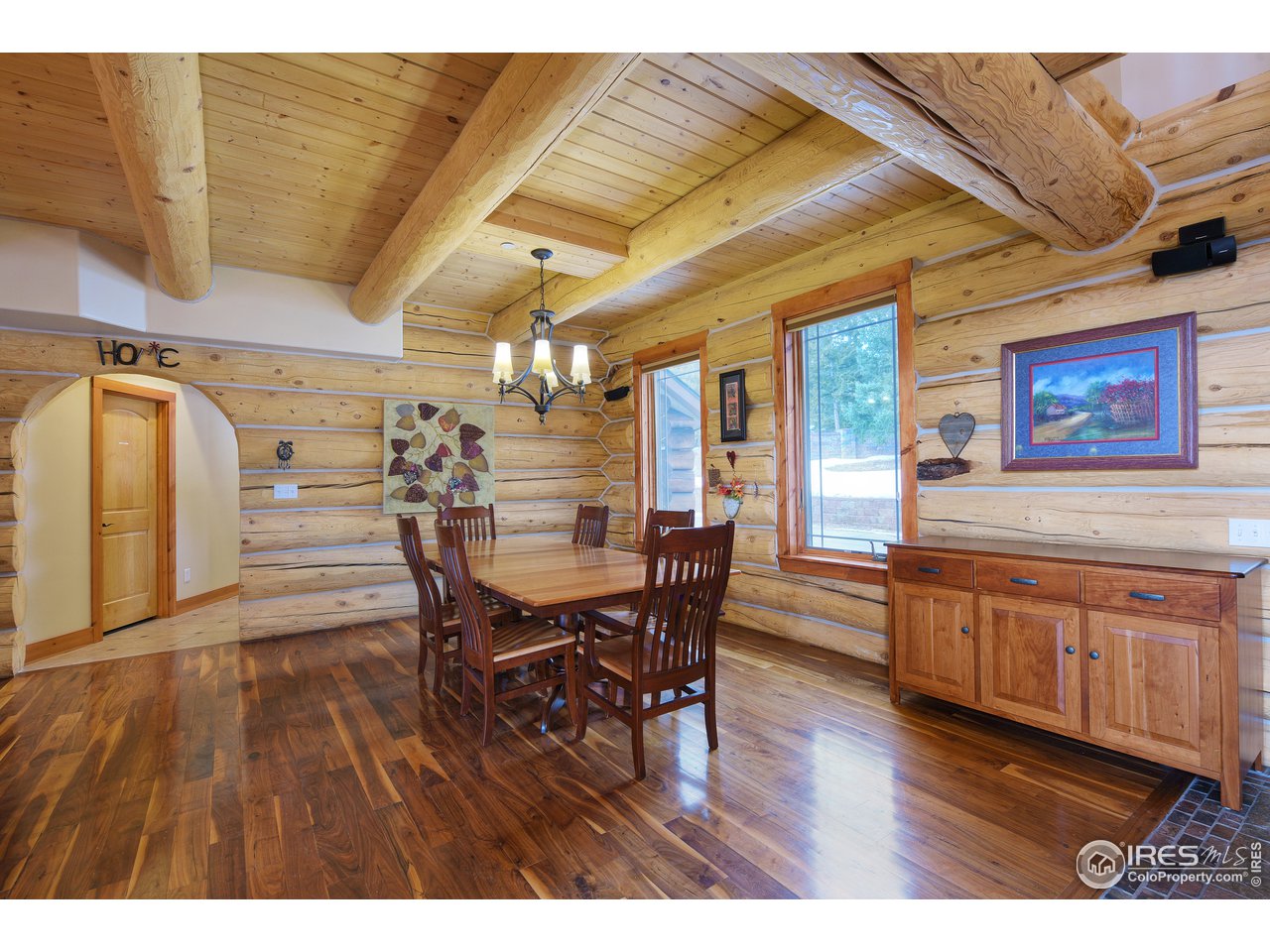 500 Ridge Road Ward, CO 80481 - Photo 3 of 31 a view of a dining room with furniture window and wooden floor