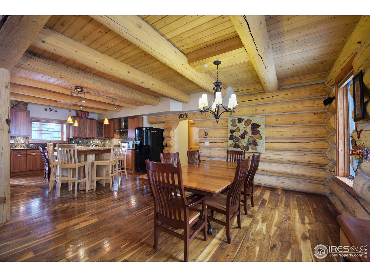 500 Ridge Road Ward, CO 80481 - Photo 4 of 31 a dining room with furniture and wooden floor
