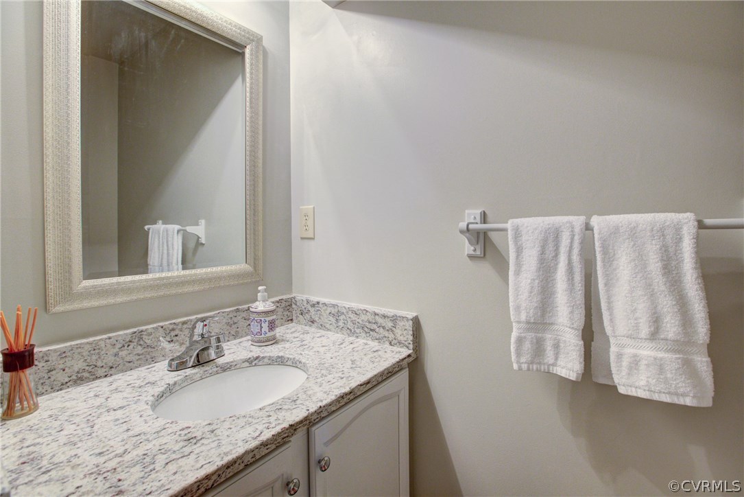 11109 Warren View Road Henrico, VA 23233 - Photo 18 of 38 Half bath on the main floor with granite counters