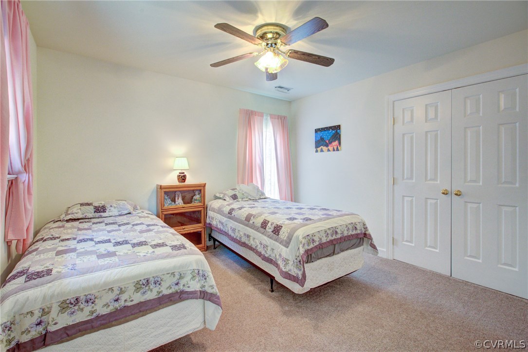 11109 Warren View Road Henrico, VA 23233 - Photo 24 of 38 Bedroom four with new carpet, ceiling fan, and lar