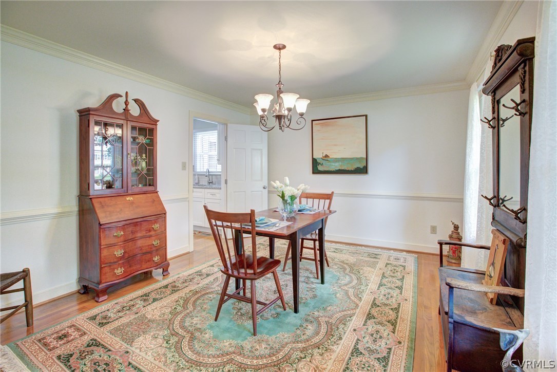 11109 Warren View Road Henrico, VA 23233 - Photo 6 of 38 Dining Room/Office with chandelier, hardwood floor