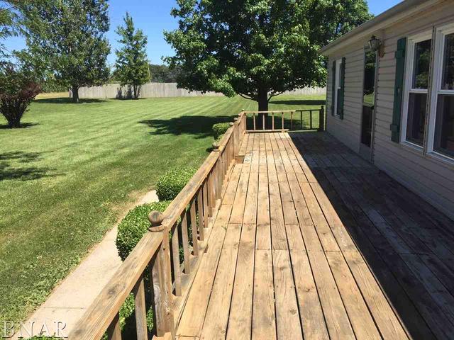 12846 Taft Road Clinton, IL 61727 - Photo 4 of 21 a view of deck with a large swimming pool