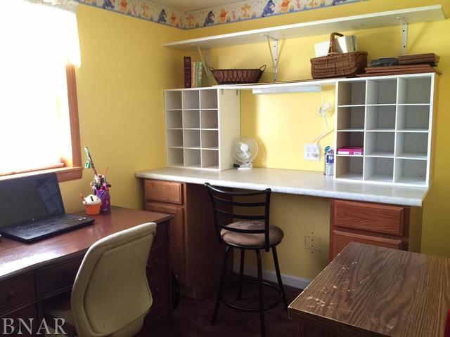12846 Taft Road Clinton, IL 61727 - Photo 7 of 21 a workspace with furniture and window