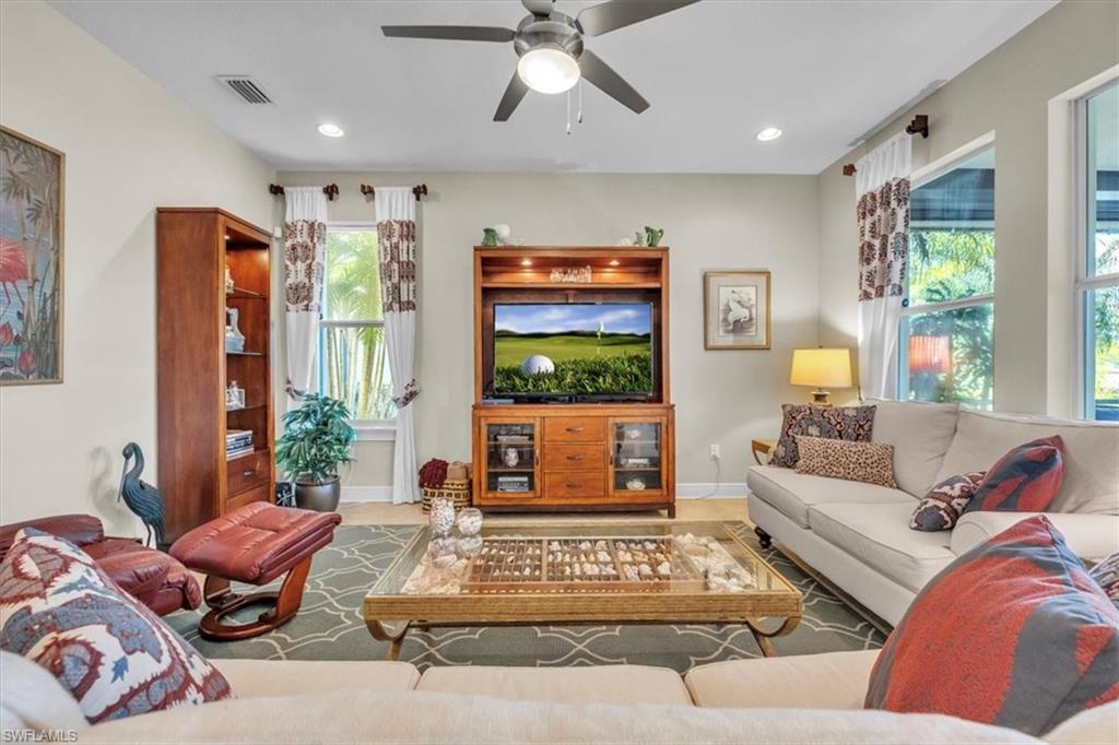 16480 Windsor Way Alva, FL 33920 - Photo 11 of 48 a living room with furniture and a large window