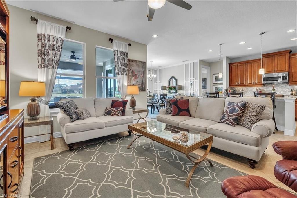 16480 Windsor Way Alva, FL 33920 - Photo 12 of 48 a living room with furniture and a large window