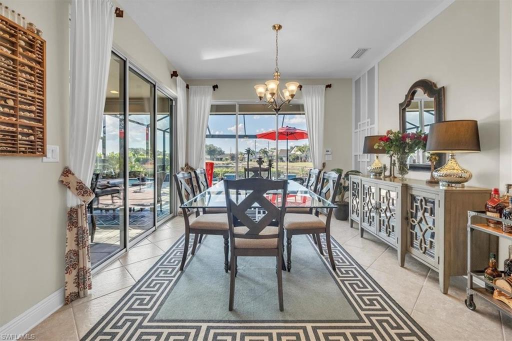 16480 Windsor Way Alva, FL 33920 - Photo 19 of 48 a view of a dining room with furniture window and outside view
