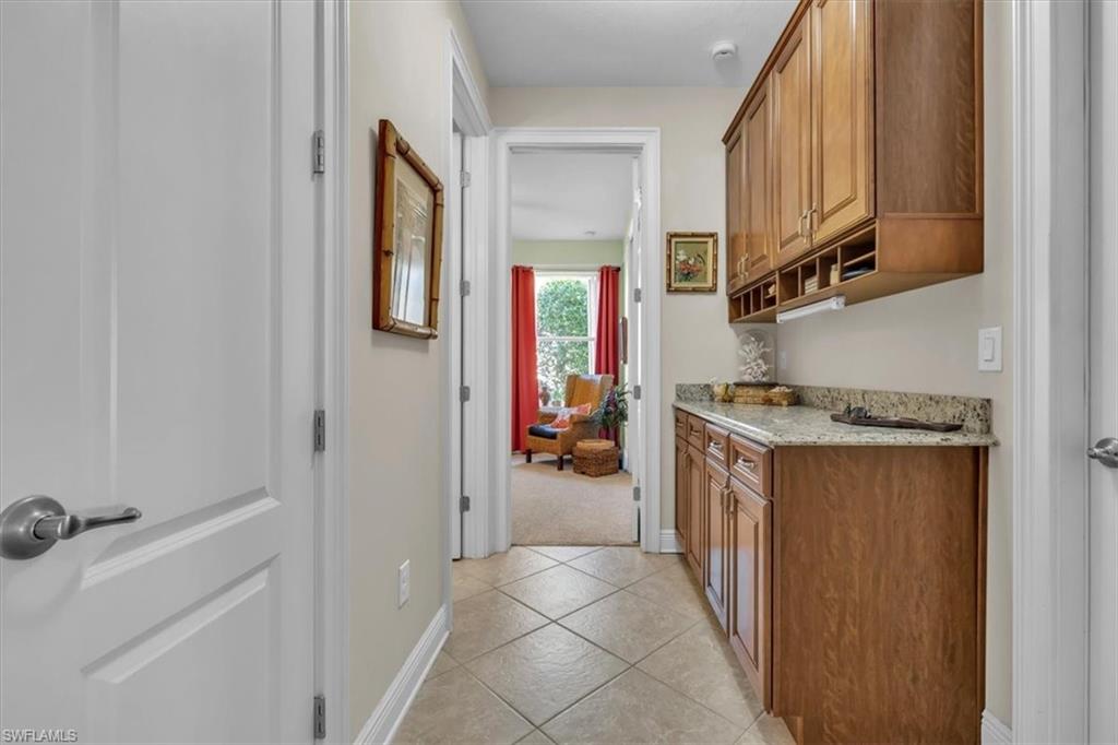 16480 Windsor Way Alva, FL 33920 - Photo 25 of 48 a view of hallway with washer and dryer