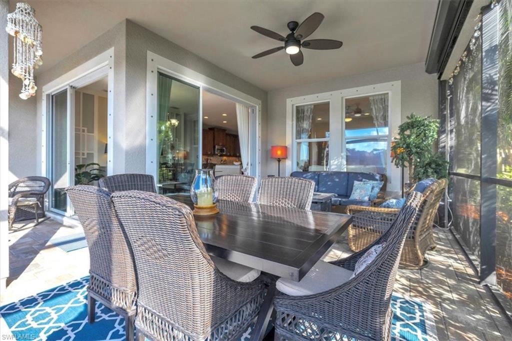 16480 Windsor Way Alva, FL 33920 - Photo 33 of 48 a dining room with furniture window and wooden floor