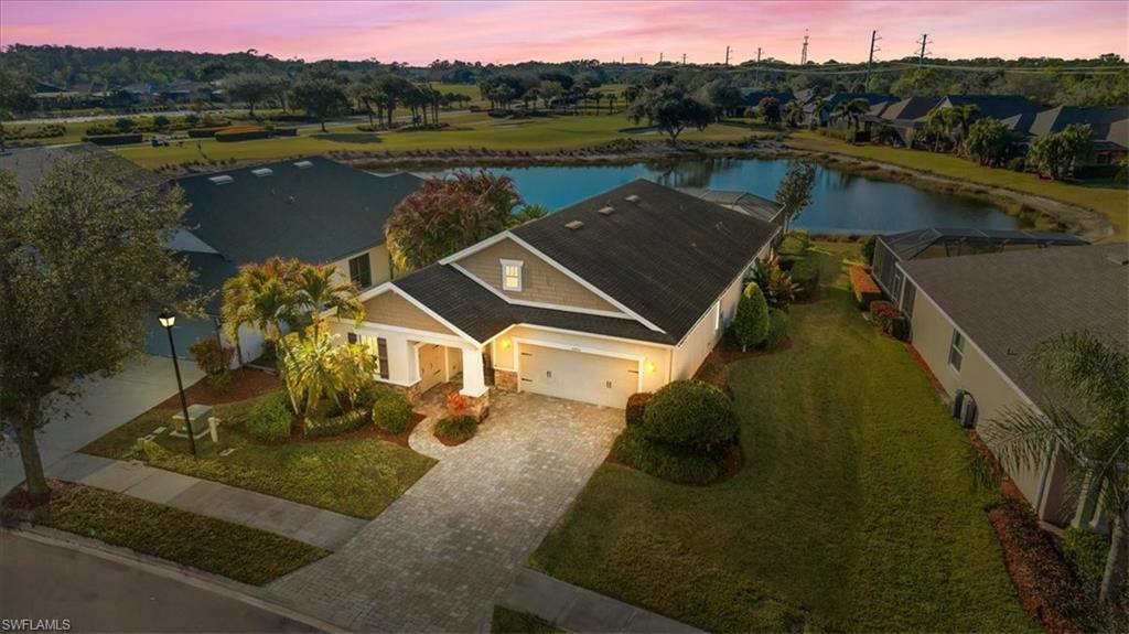 16480 Windsor Way Alva, FL 33920 - Photo 42 of 48 a view of a lake with a yard