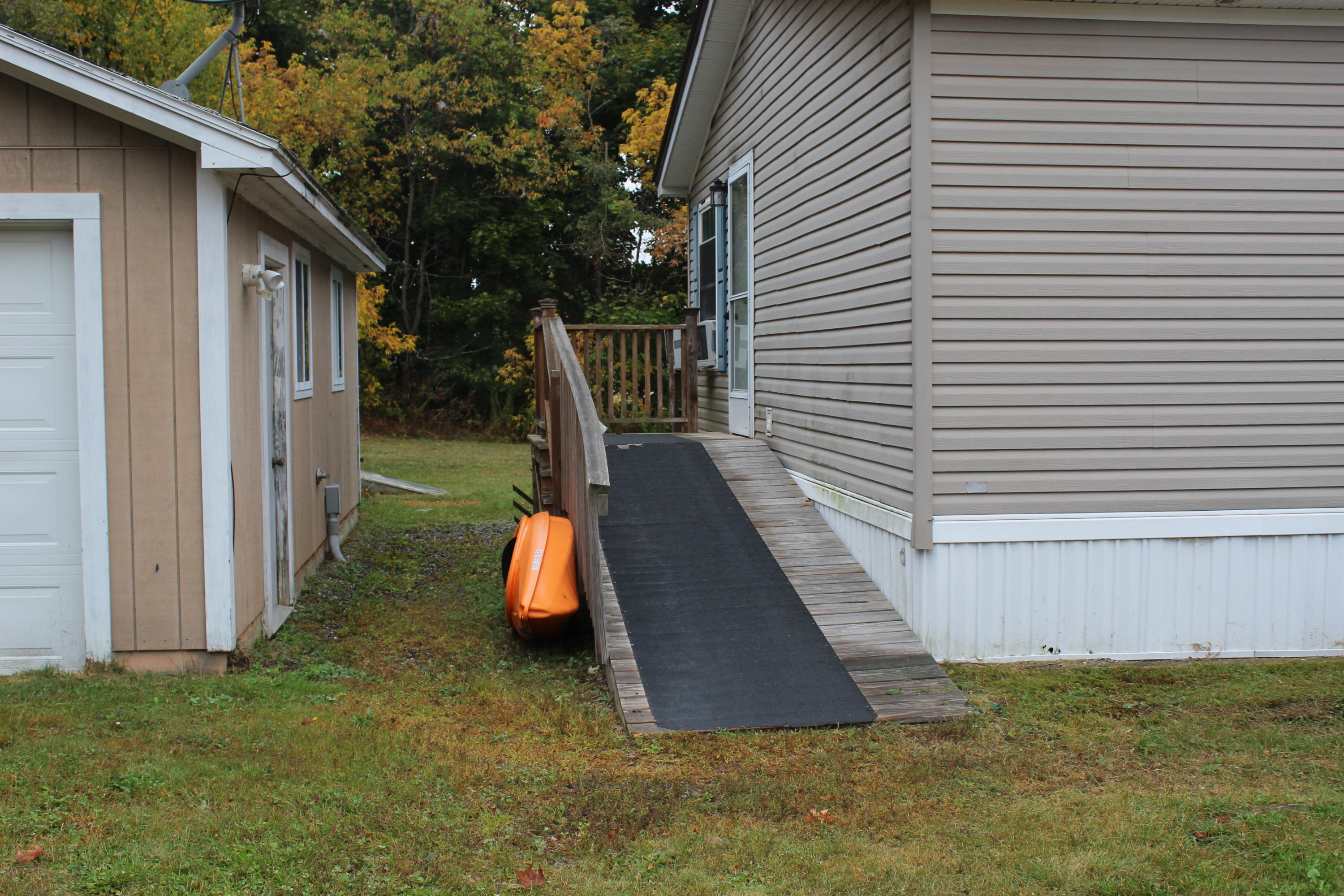 29 New England Road Searsmont, ME 04973 - Photo 4 of 26 ramp to side entrance