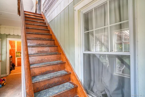 a view of entryway with staircase