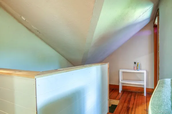 a workspace with furniture and wooden floor