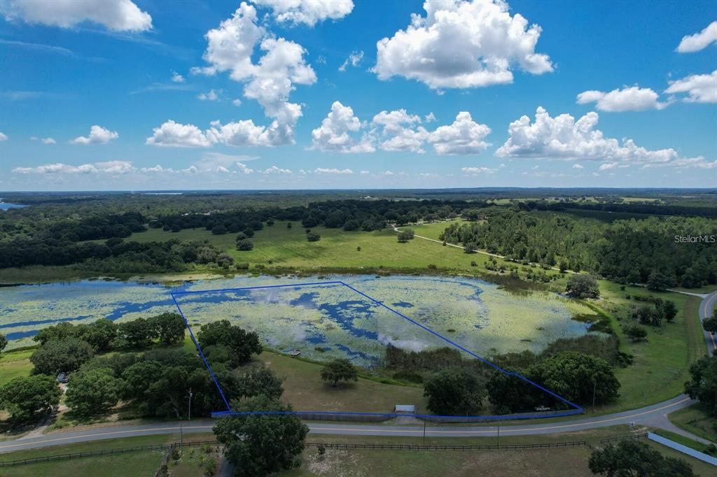a view of a yard with green space
