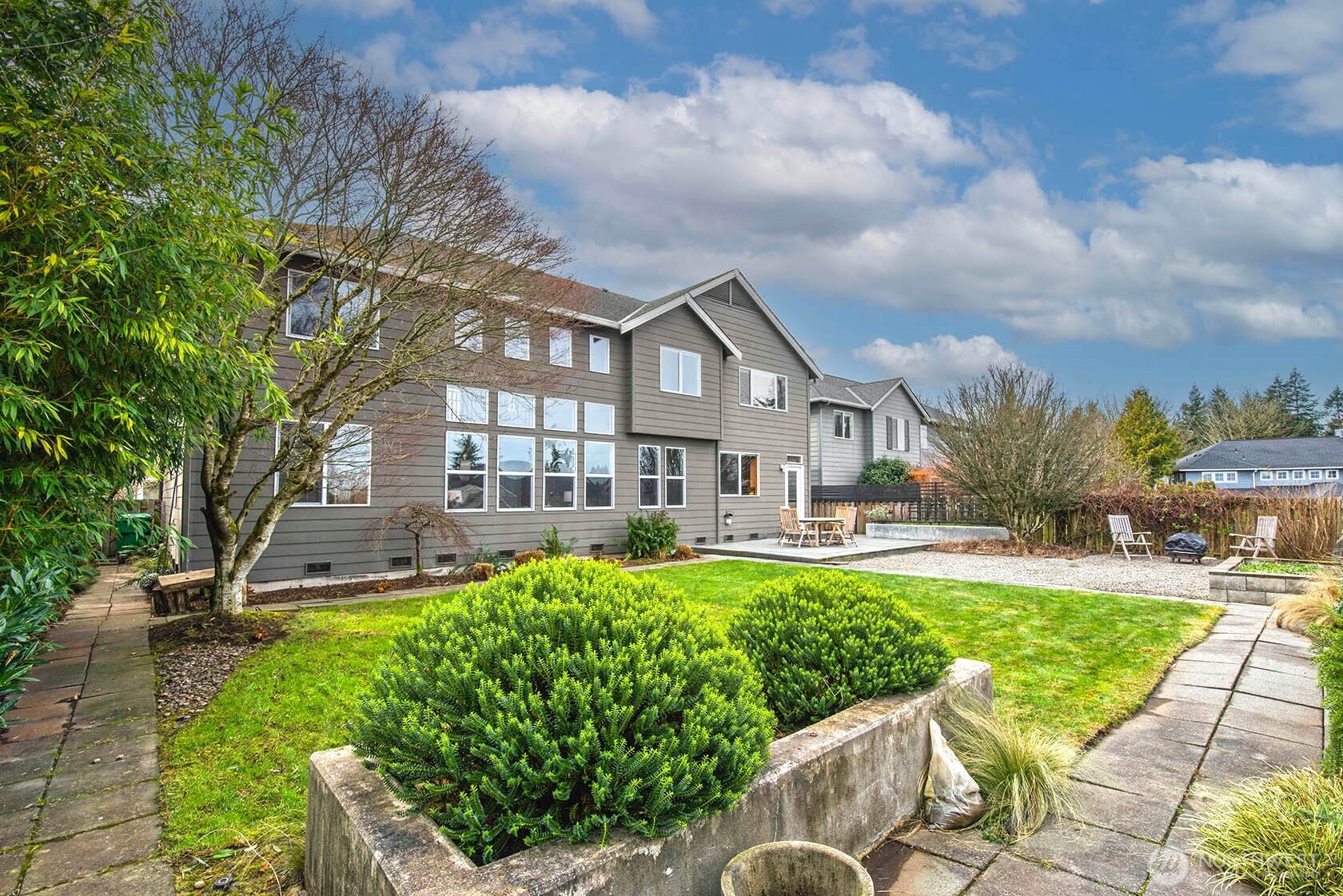 6707 126th Street Southeast Snohomish, WA 98296 - Photo 37 of 40 a view of a house with a yard porch and sitting area