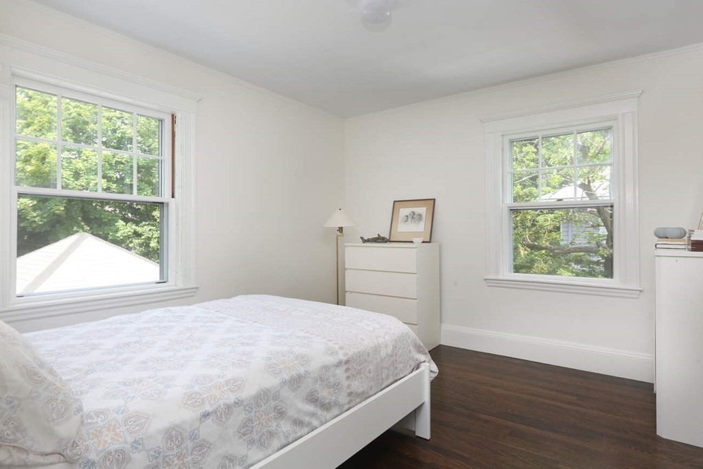 12 Nathan Road Newton, MA 02459 - Photo 12 of 20 a bedroom with a bed and a window