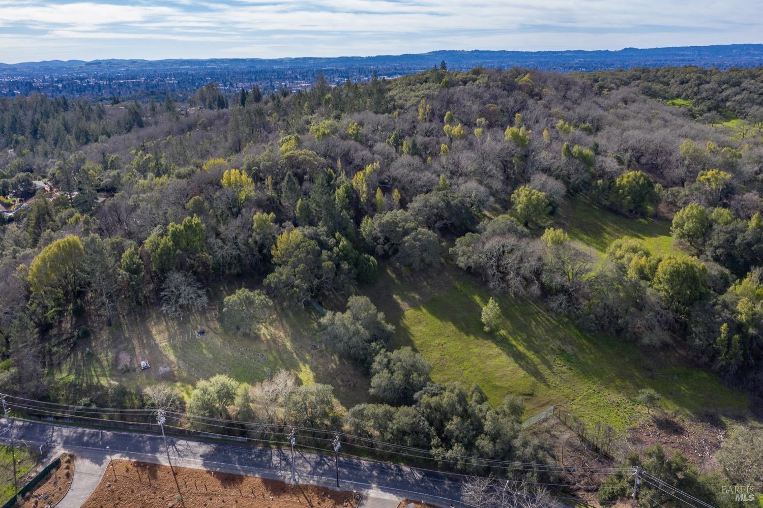 3473 Parker Hill Road Santa Rosa, CA 95404 - Photo 22 of 35 a view of a lake with a mountain