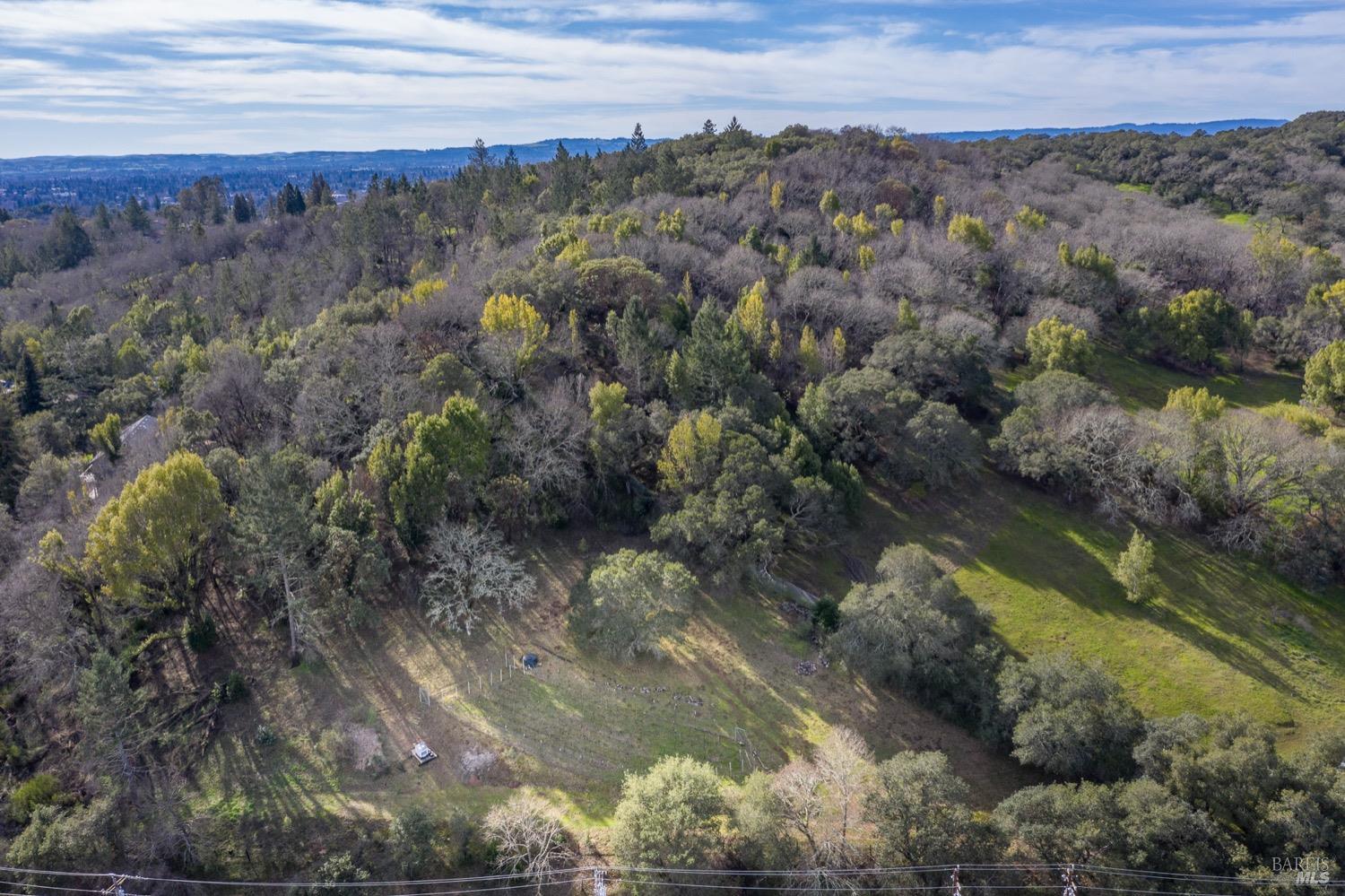 3473 Parker Hill Road Santa Rosa, CA 95404 - Photo 25 of 35 a view of a lake with mountains in the background