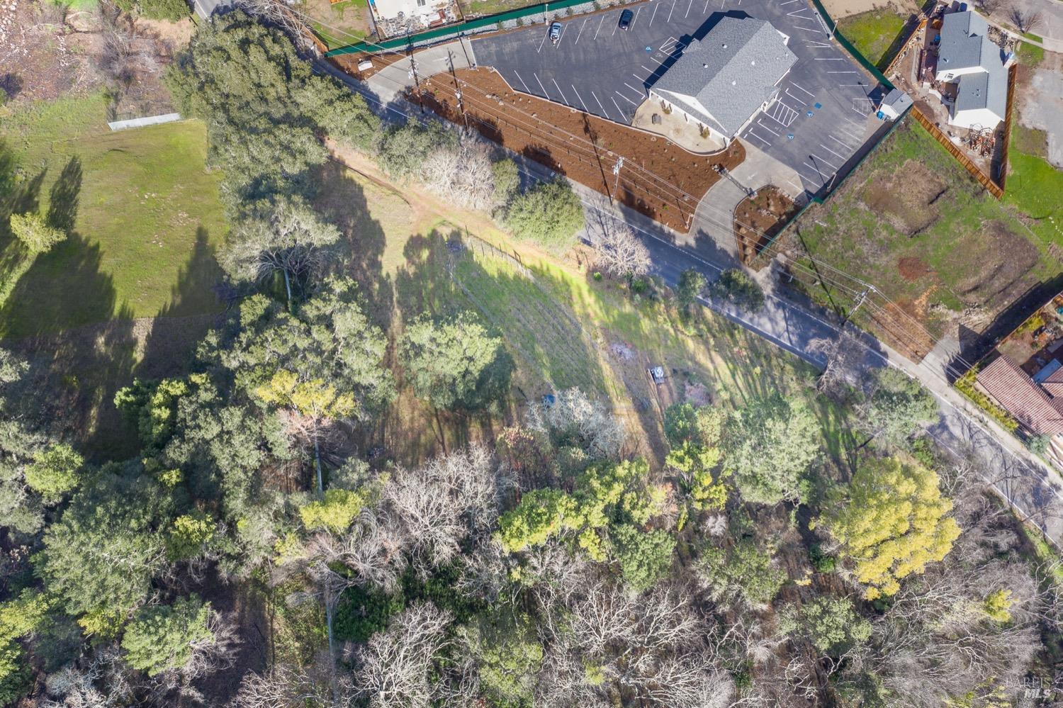 3473 Parker Hill Road Santa Rosa, CA 95404 - Photo 32 of 35 a view of a lake with a building in the background