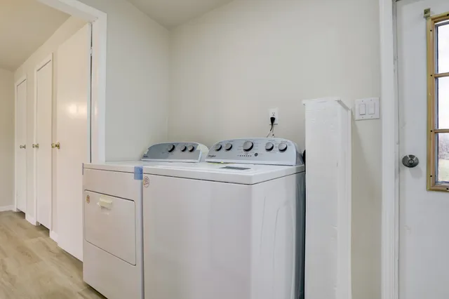 a utility room with dryer and washer