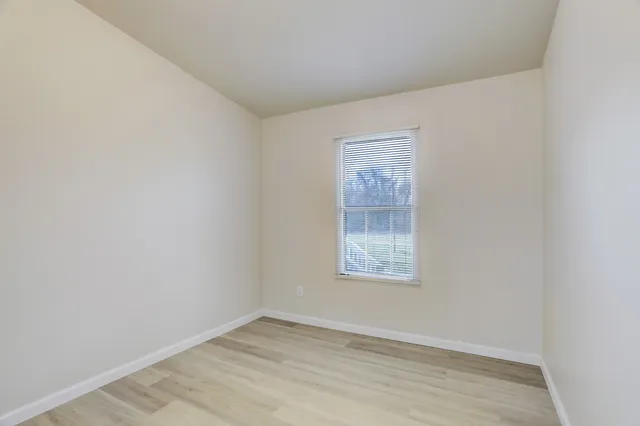 an empty room with a window
