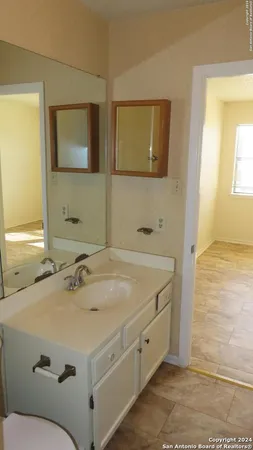 a view of a room that has a window in it