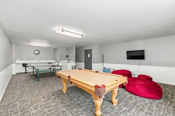 a living room with furniture and a table