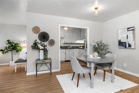 a view of a livingroom with furniture and a table